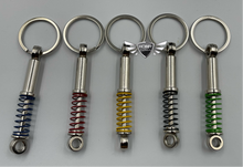Load image into Gallery viewer, Metal Shock Absorber Key Chain